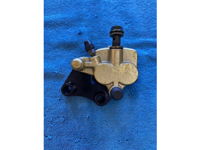 Třmen uni cross 125cc